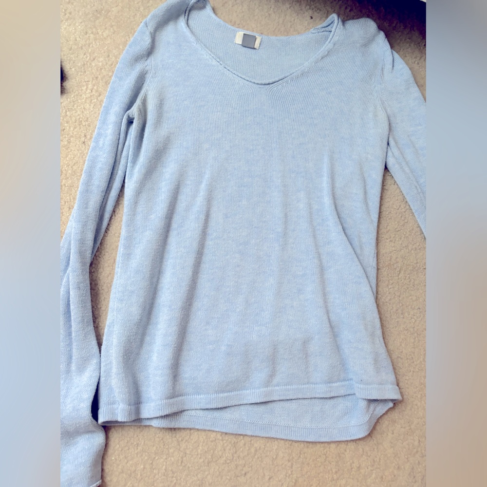 light blue sweater